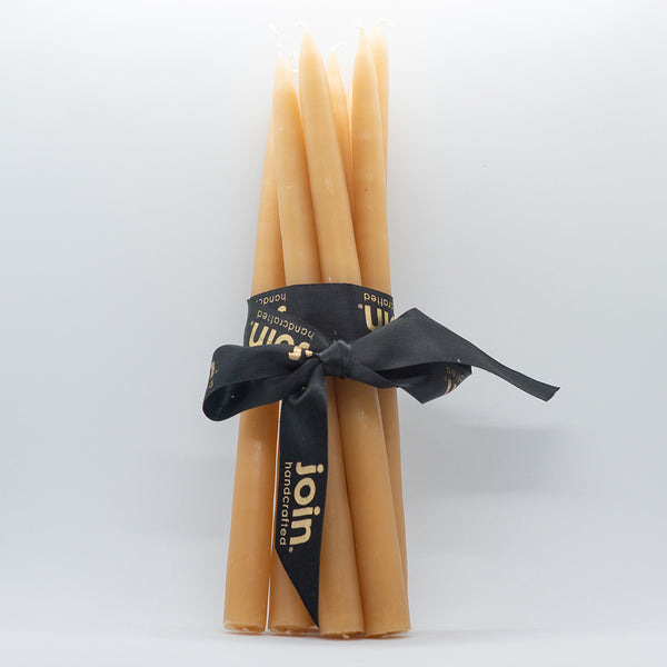 Join I A bundle of eight tapered beeswax dinner candles